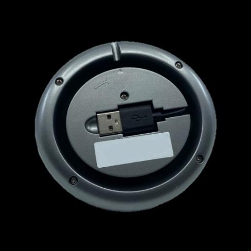 Onderaanzicht van het docking station met de USB-aansluiting voor opladen